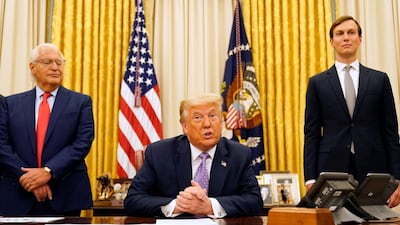 President Donald Trump speaks in the Oval Office at the White House, Thursday, Aug. 13, 2020. AP