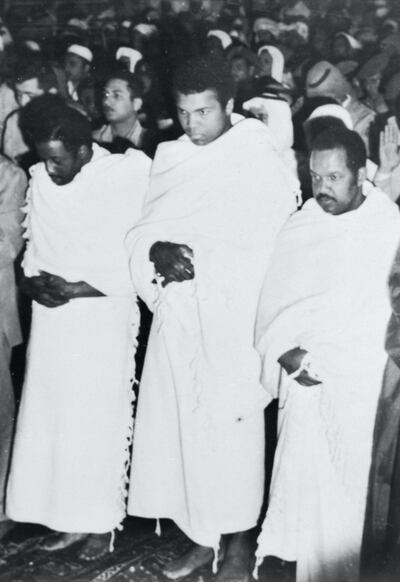 Muhammad Ali prays inside the Grand Mosque in Makkah while performing Hajj in 1972. Bettmann Archive