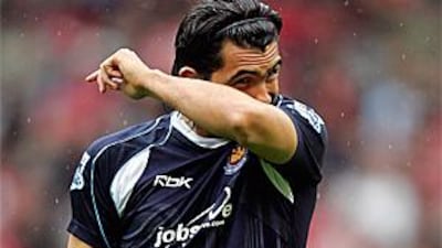 Carlos Tevez, pictured here playing for West Ham, has been at the centre of near two year saga that has seen Sheffield United threaten West Ham with compensation claims after it was revealed that the player was third-party owned.