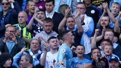 City substitute Phil Foden celebrates scoring the fourth goal. PA