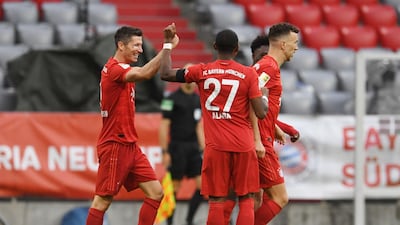 Robert Lewandowski, left, scored the third goal against Eintracht Frankfurt. AFP