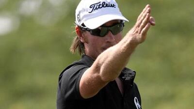 Brett Rumford is leading an impressive field at the halfway point of the Qatar Masters.