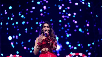 Singer Asees Kaur performs.