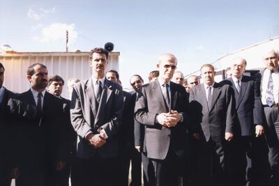 Hafez Al Assad (right) and his son Syrian President Bashar Al Assad in Damascus, in April 1994. Shutterstock.