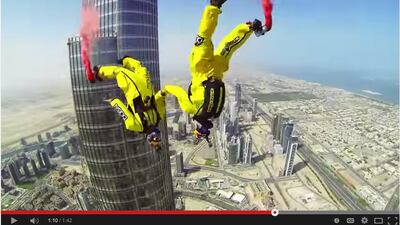 In this screengrab from YouTube, Vince Reffet and Fred Fugen break the world record for base jumping from the top of the Burj Khalifa.