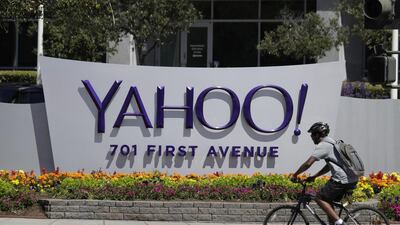 A cyclist rides past a Yahoo sign at the company's headquarters in Sunnyvale, California. The Yahoo hack exposed personal details from more than 1 billion user accounts, potentially the largest breach of an email provider in history. Marcio Jose Sanchez / AP Photo
