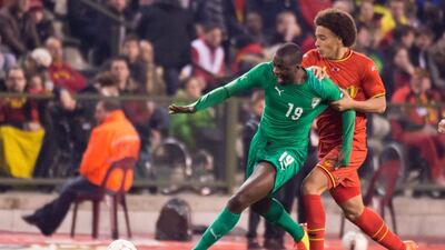 Yaya Toure and Ivory Coast drew Belgium 2-2. They'll play in Group C at the 2014 World Cup with Colombia, Greece and Japan. Geert Vanden Wijngaert / AP