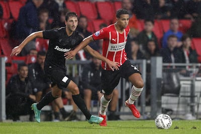 Mohamed Ihattaren, right, in pre-season action for PSV Eindhoven just before he left the club in 2021. EPA