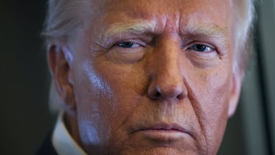 US President Donald Trump aboard Air Force One during a flight from Las Vegas, Nevada, to Miami, Florida. Reuters