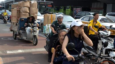 Scooters in Beijing, China. Electric scooter manufacturer Niu is said to be planning a $300m IPO. AP