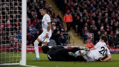 Raphinha – 1. The Brazilian drew the ire of colleagues for letting Robertson run free before the first penalty. He drifted offside in the most boneheaded manner and had what should have been an equaliser disallowed. EPA