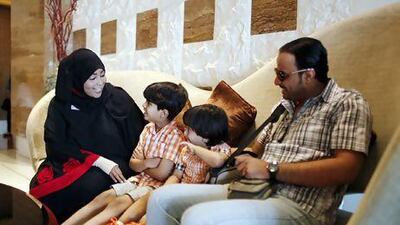 Fatma Al Shabibi with guests at the hotel. Sarah Dea / The National