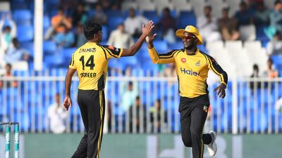 Peshawar Zalmi's Sameen Gul, left, and captain Darren Sammy celebrate during their side's win over Multan Sultans. Image courtesy of Pakistan Cricket Board