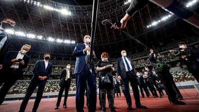 Thomas Bach, IOC president, speaks to the media as he visits the National Stadium. Reuters
