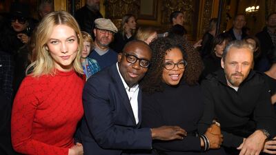 Karlie Kloss, Edward Enninful, Oprah Winfrey and Alasdhair Willis front row at Stella McCartney in Paris (Photo by Pascal Le Segretain/Getty Images)