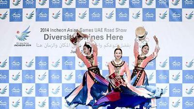 A dance troupe from Incheon performs at an event promoting the 2014 Asian Games at the Park Hyatt hotel in Dubai on Sunday. Sarah Dea / The National