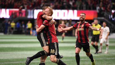 Atlanta United's Franco Escobar celebrates with Jeff Larentowicz after scoring. Reuters