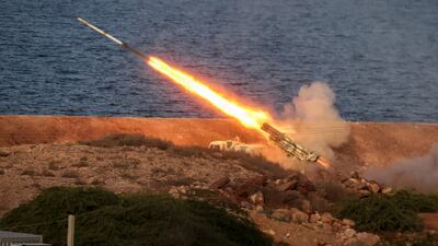 An image released by Iran's Revolutionary Guard on December 22 shows a missile launching during military exercises in the south-west of Iran. IRGC / WANA via Reuters