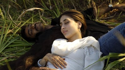 Ajay Devgan (Omi) and Kareena Kapoor (Dolly) in 'Omkara' (2006). Shutterstock
