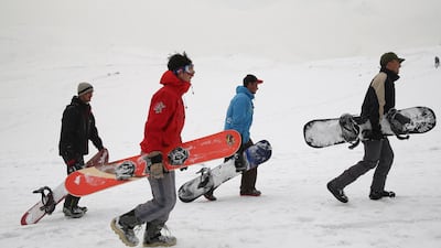 Karim Faizi 24, right, is now a trainer from the Afghanistan Snowboarding Federation. He fled Afghanistan in 2016 for Germany to escape the almost two-decade-old war between the US and Taliban militants but returned saying he did so without awaiting a final decision on his asylum case. AP
