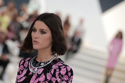 Soft black eyeliner and light make-up at Chanel. EPA