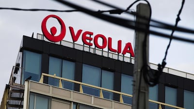 A sign above Veolia's headquarters in Paris. The company has bid $4bn to buy a stake in Suez from Engie. Engie has been given longer to consider the offer and has received interest from rival bidders. Bloomberg