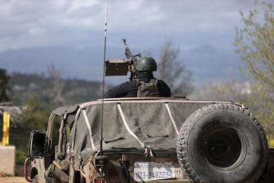 Israeli soldiers patrol near the Israel-Lebanon border. EPA
