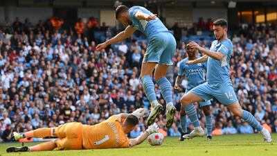 Newcastle goalkeeper Martin Dubravka spills the ball to allow Aymeric Laporte to score for Manchester City. Getty