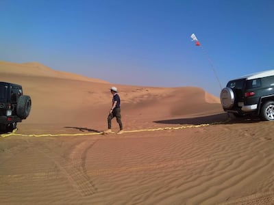 Everyone gets stuck on the dunes eventually. Help is sent via the closest appropriate vehicle in the convoy, hauling the necessary tow rope. Paul Markevicius