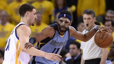 Mike Conley of the Memphis Grizzlies backs down Klay Thompson of the Golden State Warriors in his team's Game 2 victory on Tuesday in the second round of the NBA play-offs. John G Mabanglo / EPA / May 5, 2015