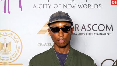 In a wrap-style top, Williams attends a dinner for the Forever Is Now art exhibition, in October 2021 in Giza, Egypt. AFP