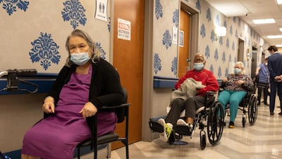 Nursing home residents line up for the coronavirus vaccine at Harlem Center for Nursing and Rehabilitation, a nursing home facility in New York. AP Photo