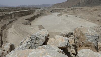 The village is near a cement factory and a mining site and the deep excavation worries residents. Jeffrey E Biteng / The National