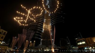 Readers say the Expo 2020 win has put Dubai and the UAE into the forefront as emerging societies on the world stage. Above, fireworks explode from Burj Khalifa after the announcement last month. Christopher Pike / The National