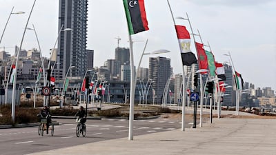 Flags of member countries are displayed ahead of an Arab Economic and Social Development Summit meeting in Beirut, Lebanon. Reuters