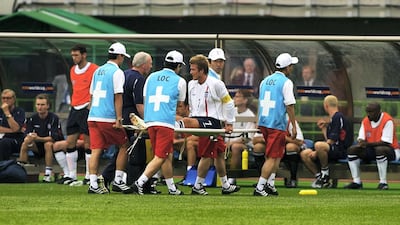 David Beckham is stretchered off for treatment in the first half of the England v Brazil World Cup Quarter Final in 2002. Beckham broke a metatarsal in his foot a couple of months before the tournament while playing for Manchester United against Deportivo La Coruna. The culprit was Deportivo's Pedro Duscher and from then on began the fitness race which gripped the nation. Magician Uri Geller urged TV viewers to put their hands on a picture of the foot to send healing energy through the TV screen. While Beckham was declared fit enough to play, he is remembered for jumping out of a crucial tackle in that quarter final. Getty Images