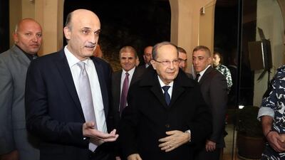Samir Geagea (C-L) welcomes Michel Aoun (C-R) to his headquarters in Maarab, north-east of Beirut, on January 18, 2016. Aldo Ayoub/Lebanese Forces/AFP