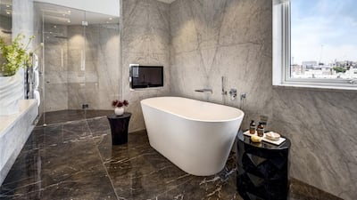 There is a generous master suite, featuring its own walk-in dressing room and large Carrara marble en suite bathroom with bath and shower facilities.. Courtesy Berkshire Hathaway HomeServices London