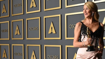 US actress Laura Dern poses with the award for Best Actress in a Supporting Role for "Marriage Story". AFP