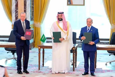 The Turkish, Saudi and Pakistani leaders after signing the Mecca Joint Defence Agreement. AFP
