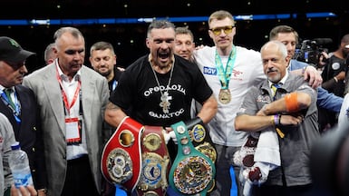 Oleksandr Usyk celebrates winning the IBF, IBO, WBC and WBO heavyweight bout against Daniel Dubois at Wembley Stadium in London. Getty Images