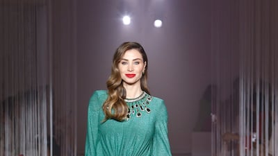 Lebanese presenter Annabella Hilal also walked the runway.