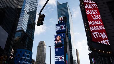 Signs read "Congrats Biden Harris" in the Times Square neighbourhood of New York, US. Bloomberg