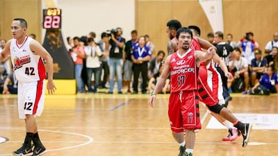 Manny Pacquiao’s points to the bench. Victor Besa for The National