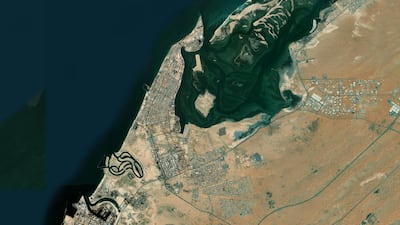 Umm Al Quwain, one of the seven emirates of the UAE, seen from space. The emirate is on a peninsula and has many attractive sites, including ancient forts. Zoom Earth