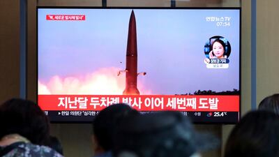 People in Seoul watch a TV report on North Korea's latest missile launch on August 2, 2019. The caption on the screen says: "The third provocation." AP Photo