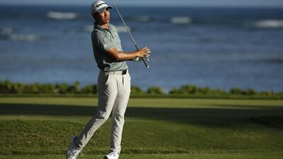 Collin Morikawa plays his shot from the 17th tee during the third round of the Sony Open in Hawaii. AFP
