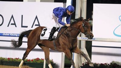 Christophe Soumillon and Benbatl win the Al Maktoum Challenge at Meydan. Pawan Singh / The National