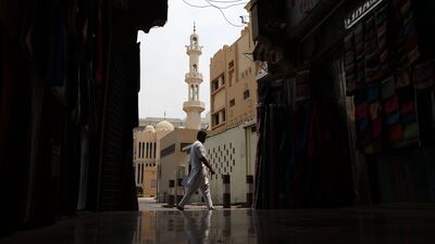 A mosque in Bur Dubai glimmers in the sun on a hot day in Bur Dubai. Chris Whiteoak / The National