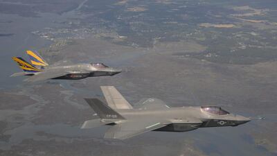 F-35C Lightning IIs on a test flight in the Atlantic test range. With plans to deliver 2,443 planes in different versions for the US air force, navy and marines, the programme is now the most expensive in US military history. Lockheed has pledged to cut costs. Keith Simmons / AFP